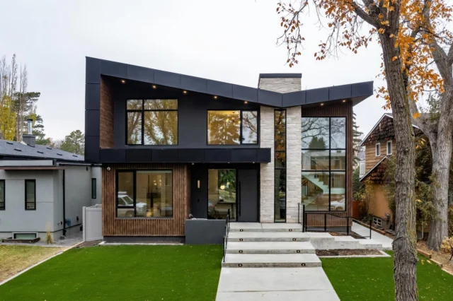 Harmony isn’t accidental. It’s designed.

At first glance, this modern exterior makes a statement. But look closer and you’ll see it’s the details that truly carry the design.

Vertical wood panelling draws the eye upward, adding warmth and rhythm. 

Stone grounds the home with texture and permanence. 

Black accents create contrast and definition, sharpening every line and framing every feature with intention.

This is what happens when materials aren’t competing for attention but collaborating to create something cohesive.

Design and Interiors By @bossdesignltd
Build By @rimrockelevations

YEG Design | YEG Homes | YEG Infill | YEG Home Design | Modern Home Design